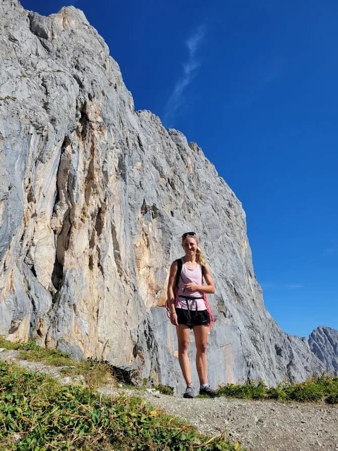 Climbers after the approach to the south face of the Schüsselkar during an alpine multipitch climb